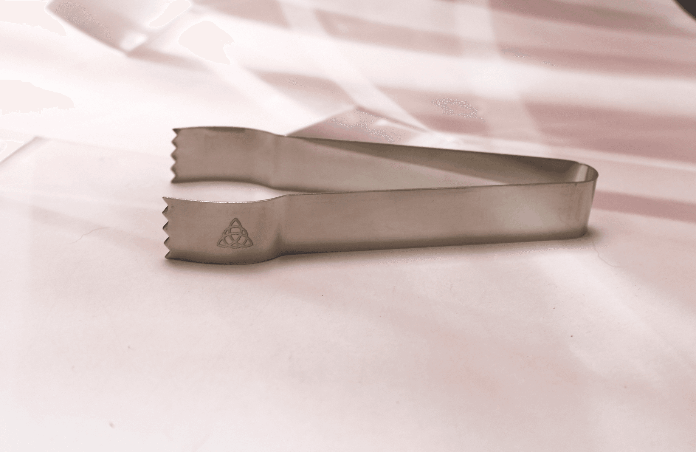 Triquetra Stainless Steel Tongs - Image 1