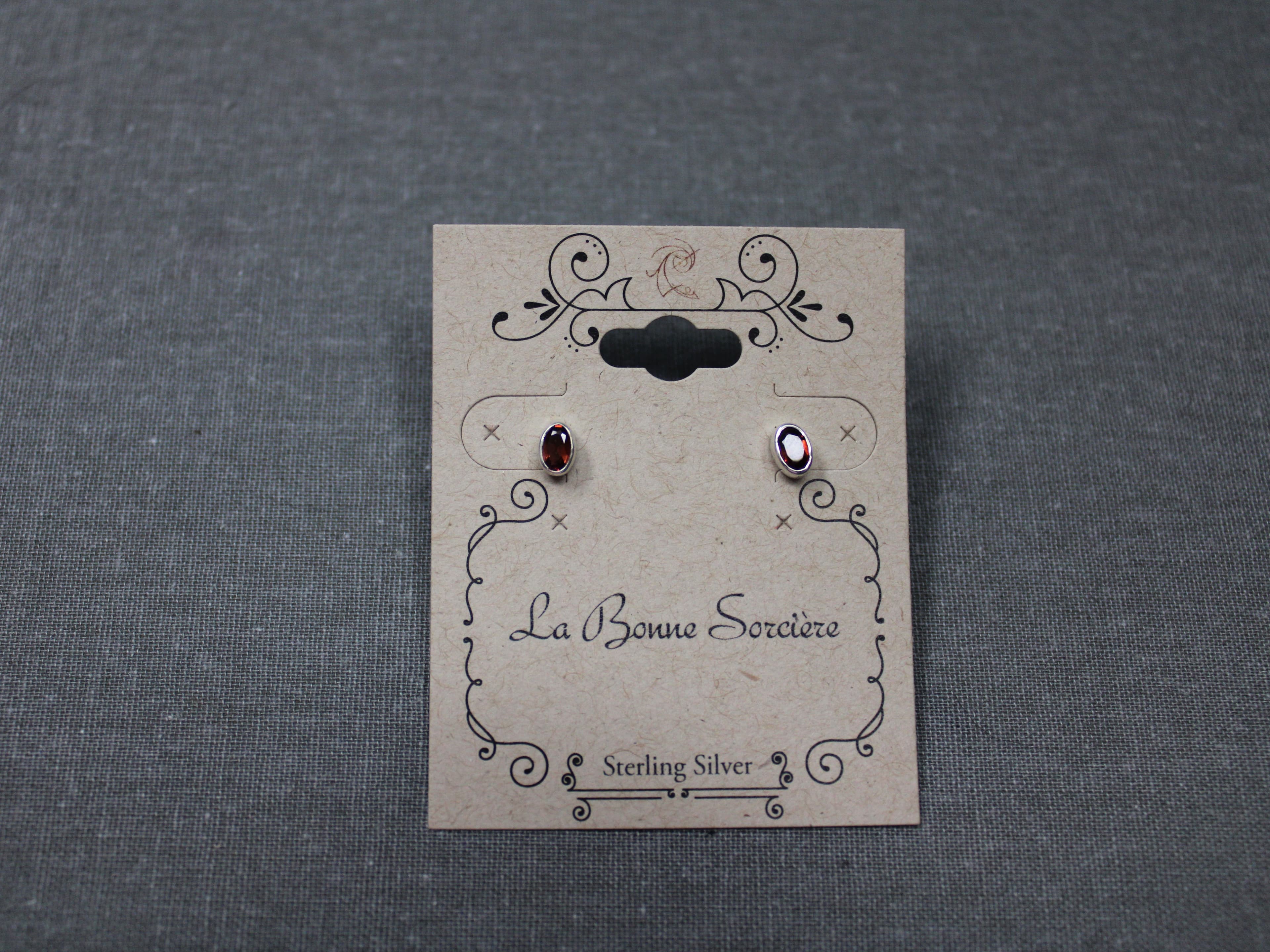 Faceted Garnet Stud Earrings in 925 Sterling Silver - Image 1