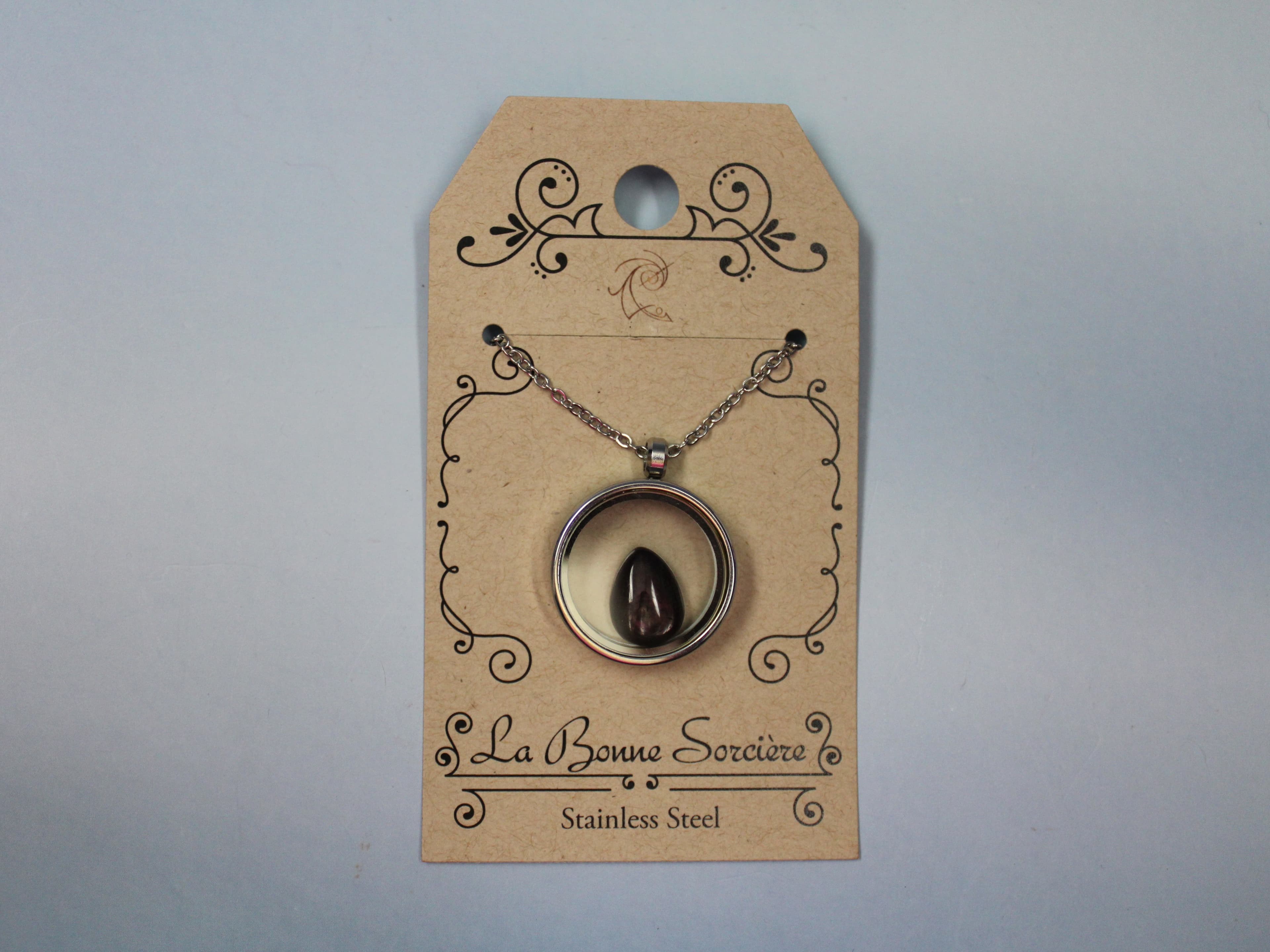 Silver Sheen Obsidian Tear Drop in a Stainless Steel Glass Locket - Image 1